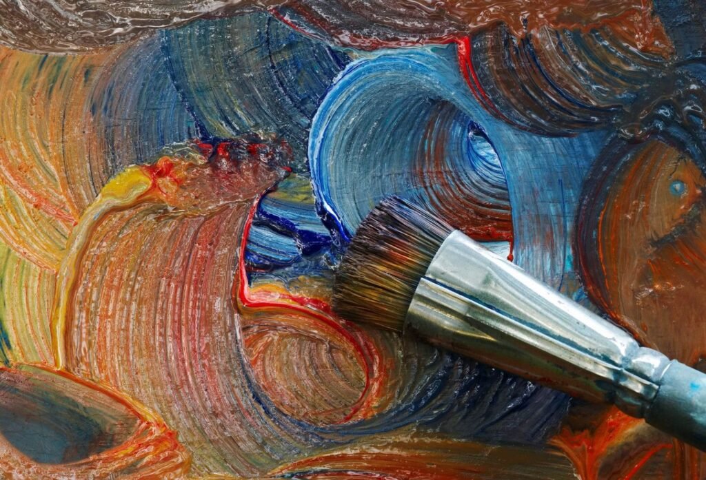 Painting in oil colours brush and colors PX54JDG.jpg